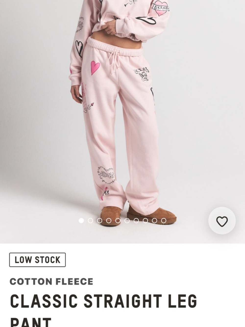 SKIMS Classic Straight Leg Cotton Fleece Pants in Light Pink with Graphic Hearts